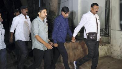 Kiran Patel was produced before a court by the Ahmedabad crime branch officials on Saturday (PTI) Kiran Patel was produced before a court by the Ahmedabad crime branch officials on Saturday (PTI)