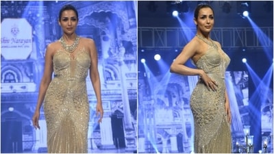 Malaika Arora in plunge-neck golden gown and bold makeup walks the ramp. (HT Photo/Varinder Chawla) Malaika Arora in plunge-neck golden gown and bold makeup walks the ramp. (HT Photo/Varinder Chawla)