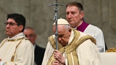 Pope Francis leads the Easter Vigil mass on April 8, 2023 at St. Peter's basilica in The Vatican, as part of celebrations of the Holy Week. (AFP) Pope Francis leads the Easter Vigil mass on April 8, 2023 at St. Peter's basilica in The Vatican, as part of celebrations of the Holy Week. (AFP)