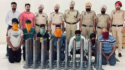 The accused allegedly involved in robbing a Ludhiana factory unit in police custody. (HT Photo) The accused allegedly involved in robbing a Ludhiana factory unit in police custody. (HT Photo)
