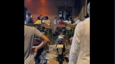 In the video, a group can be seen fighting outside the bar. (source:Twitter/@MumbaiPressNews) In the video, a group can be seen fighting outside the bar. (source:Twitter/@MumbaiPressNews)