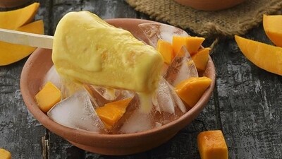 Mango Kulfi: Kulfi is a popular frozen dessert in India, and during summer, mango kulfi is a must-try. It's made by blending fresh mangoes, condensed milk, and heavy cream, then freezing the mixture into molds. It's creamy, rich, and has a delicious mango flavor. (Pinterest) Mango Kulfi: Kulfi is a popular frozen dessert in India, and during summer, mango kulfi is a must-try. It's made by blending fresh mangoes, condensed milk, and heavy cream, then freezing the mixture into molds. It's creamy, rich, and has a delicious mango flavor. (Pinterest)