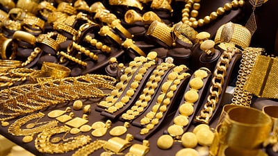 On Thursday, the price of 10 grams of gold was decreased by ₹110 to ₹57,870. (Istock) On Thursday, the price of 10 grams of gold was decreased by ₹110 to ₹57,870. (Istock)