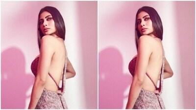Mouni’s gown also came with cut-out details at the sides of the midriff, and a thigh high slit with a train. In silver stilettos from the shelves of Jimmy Choo, Mouni aced the look. (Instagram/@imouniroy) Mouni’s gown also came with cut-out details at the sides of the midriff, and a thigh high slit with a train. In silver stilettos from the shelves of Jimmy Choo, Mouni aced the look. (Instagram/@imouniroy)