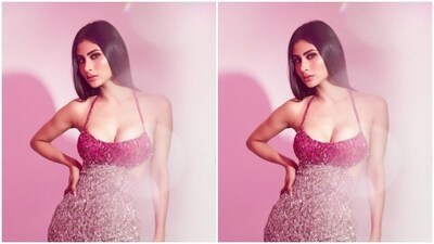 Mouni played muse to fashion designer Dolly J and picked a silver and red sequined gown from the shelves of the designer. (Instagram/@imouniroy) Mouni played muse to fashion designer Dolly J and picked a silver and red sequined gown from the shelves of the designer. (Instagram/@imouniroy)
