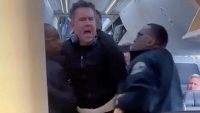 American Airlines passenger being dragged off flight. (Reddit ) American Airlines passenger being dragged off flight. (Reddit )