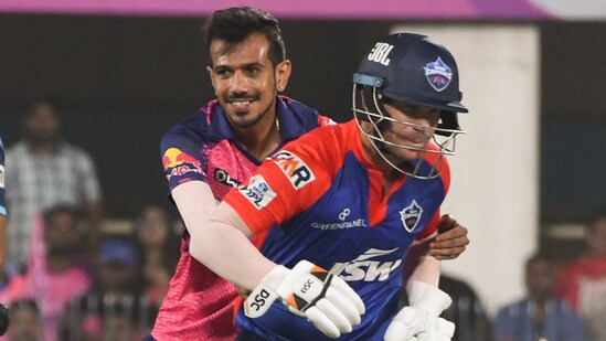 Delhi Capitals batter David Warner and Rajasthan Royals bowler Yuzvendra Chahal during the IPL 2023 match at ACA Stadium, Barsapara in Guwahati.(PTI)