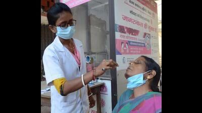 A health official collects swab samples for Covid-19 testing in Patna on Saturday. (HT Photo) A health official collects swab samples for Covid-19 testing in Patna on Saturday. (HT Photo)