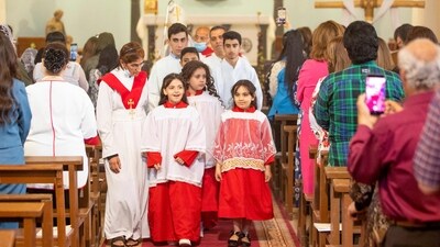 Chaldean Catholic Iraqis attend Easter mass at the Virgin Mary Cathedral in the southern Iraqi city of Basra. (AFP)
