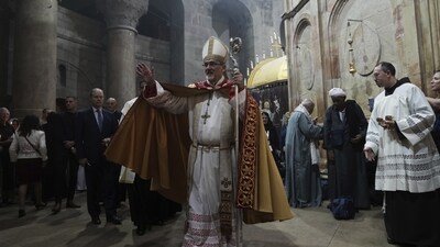Latin Patriarch of Jerusalem leads the Easter Sunday Mass at the Church of the Holy Sepulchre, where many Christians believe Jesus was crucified, buried and rose from the dead, in the Old City of Jerusalem. (AP)