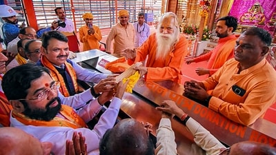 Maharashtra chief minister Eknath Shinde with deputy CM Devendra Fadnavis and supporters during a visit to Ayodhya on Sunday, (PTI) Maharashtra chief minister Eknath Shinde with deputy CM Devendra Fadnavis and supporters during a visit to Ayodhya on Sunday, (PTI)