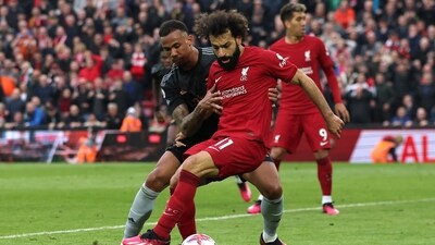 Liverpool's Mohamed Salah in action with Arsenal's Gabriel (REUTERS)