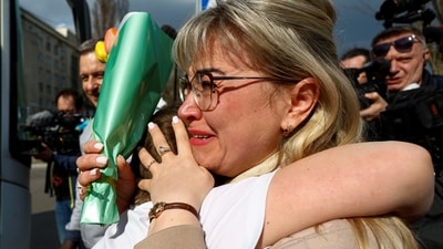 Russia-Ukraine War: Yana Shapochko reacts as she embraces her 9-year-old nephew Danyil. (Reuters)