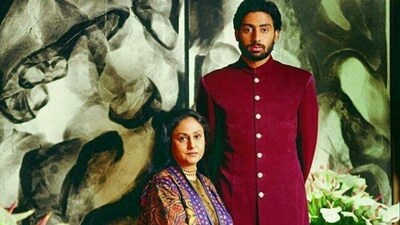 Jaya Bachhan and Abhishek pose for a regal photo together. Jaya Bachhan and Abhishek pose for a regal photo together.