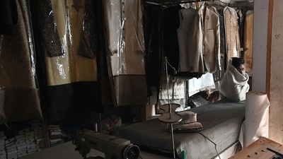 A tailor sits at his shop in a market during a nationwide power outage in Pakistan's Rawalpindi. (AFP/ representative image) A tailor sits at his shop in a market during a nationwide power outage in Pakistan's Rawalpindi. (AFP/ representative image)