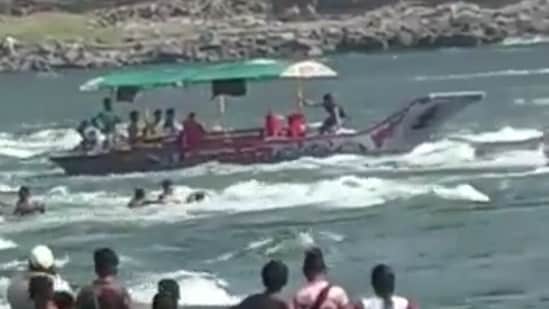 Some videos of the incident have also surfaced on social media, in which boatmen are seen using their boats to rescue people trapped in the river and on rocks. (Twitter )