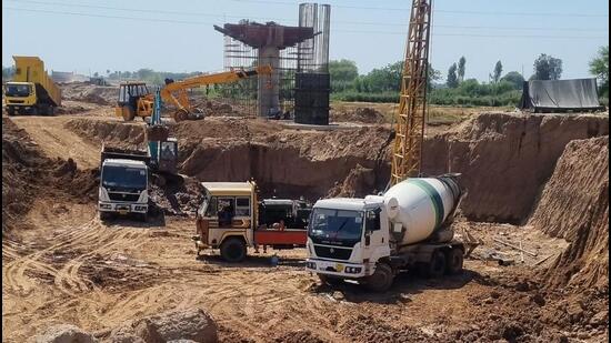Work going on in full swing at the Greenfield Alignment near IT City. (HT Photo)
