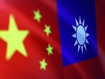 China-Taiwan Conflict: Chinese and Taiwanese flags are seen in this illustration.