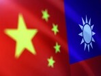 China-Taiwan Conflict: Chinese and Taiwanese flags are seen in this illustration.