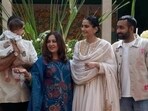 Sonam Kapoor posing with her husband Anand Ahuja, his brother Anant and mother Priya Ahuja. Sonam Kapoor posing with her husband Anand Ahuja, his brother Anant and mother Priya Ahuja.