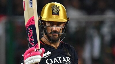 Faf du Plessis celebrates after scoring a half-century during the IPL match between Royal Challengers Bangalore and Lucknow Super Giants at the M Chinnaswamy Stadium in Bengaluru (AFP)