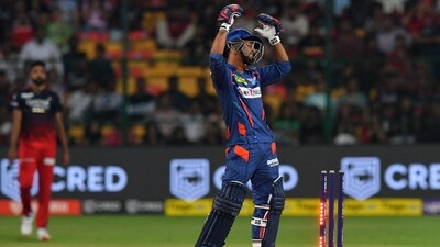 Lucknow Super Giants Ayush Badoni reacts after hitting the wicket during the IPL match against Royal Challengers Bangalore (AFP)