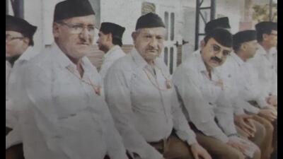 Jaiveer Singh (first in row) in Ganvesh attire. The picture was published in local newspapers after an RSS programme in February 2018 and is now being circulated to show his link with the outfit. (Sourced) Jaiveer Singh (first in row) in Ganvesh attire. The picture was published in local newspapers after an RSS programme in February 2018 and is now being circulated to show his link with the outfit. (Sourced)