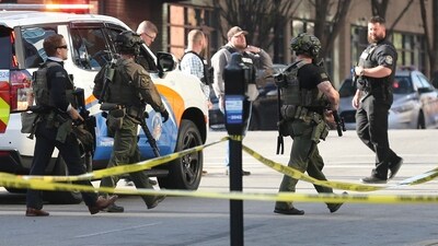Police deploy at the scene of a mass shooting near Slugger Field baseball stadium in downtown Louisville, Kentucky, United States. (via REUTERS)