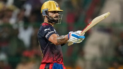 Royal Challengers Bangalore batter Virat Kohli celebrates after scoring a half-century during the IPL 2023 match against Lucknow Super Giants (PTI)