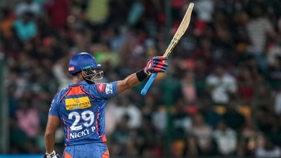 Nicholas Pooran celebrates after scoring a half-century during the IPL 2023 cricket match between Royal Challengers Bangalore and Lucknow Super Giants. (PTI)