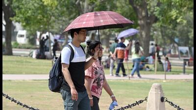 People out on a hot day at Kartavya Path, in New Delhi on Monday. (Sanjeev Verma/HT PHOTO) People out on a hot day at Kartavya Path, in New Delhi on Monday. (Sanjeev Verma/HT PHOTO)