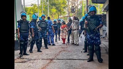 Rapid Action Force personnel deployed at the Shastri Nagar area in Jamshedpur on Monday. (PTI) Rapid Action Force personnel deployed at the Shastri Nagar area in Jamshedpur on Monday. (PTI)
