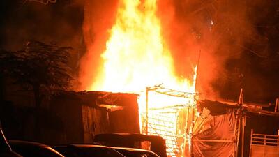 Shops were set ablaze in Jamshedpur on Sunday. (ANI) Shops were set ablaze in Jamshedpur on Sunday. (ANI)
