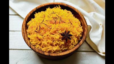 Yellow-coloured sweets such as the zarda are offered in gurudwaras and cooked in homes (Shutterstock) Yellow-coloured sweets such as the zarda are offered in gurudwaras and cooked in homes (Shutterstock)