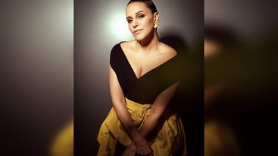 Neha Dhupia's outfit comes with a black off-shoulder jumpsuit and a canary yellow taffeta overskirt. (Instagram/@nehadhupia) Neha Dhupia's outfit comes with a black off-shoulder jumpsuit and a canary yellow taffeta overskirt. (Instagram/@nehadhupia)
