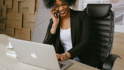 An Apple laptop ensures superior work experience. (Pexels)