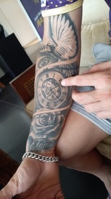 On the right forearm of Rinku Singh, wedged between tattoos of a rose sprouting on the word ‘Family’ and a dove for peace, is a clock where time stands still at 2:26—the exact moment Kolkata Knight Riders had bought him at the 2018 IPL auction (Somshuvra Laha) On the right forearm of Rinku Singh, wedged between tattoos of a rose sprouting on the word ‘Family’ and a dove for peace, is a clock where time stands still at 2:26—the exact moment Kolkata Knight Riders had bought him at the 2018 IPL auction (Somshuvra Laha)
