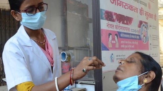 A health official collects swab samples for Covid-19 testing in Patna on Saturday. (HT Photo) A health official collects swab samples for Covid-19 testing in Patna on Saturday. (HT Photo)