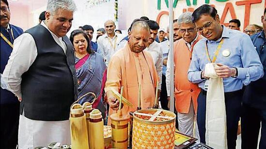 Chief minister Yogi Adityanath visiting the exhibition while inaugurating national climate conclave jointly with Union environment minister Bhupender Yadav, at Indira Gandhi Pratishthan in Lucknow on Monday. (Deepak Gupta/HT Photo)