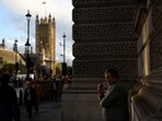 UK's ‘Quit Smoking’ Plan: A man vapes outside the Houses of Parliament, in London, Britain.