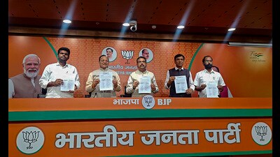 BJP leaders Dharmendra Pradhan and Mansukh Mandaviya release the party's first list of 189 candidates for the May 10 Karnataka assembly polls on Tuesday. (PTI) BJP leaders Dharmendra Pradhan and Mansukh Mandaviya release the party's first list of 189 candidates for the May 10 Karnataka assembly polls on Tuesday. (PTI)