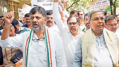 Congress leaders DK Shivakumar and Siddaramaiah met at AICC chief Mallikarjun Kharge’s residence in Delhi on Monday night to finalise the third list of candidates, but no decision was taken. (PTI) Congress leaders DK Shivakumar and Siddaramaiah met at AICC chief Mallikarjun Kharge’s residence in Delhi on Monday night to finalise the third list of candidates, but no decision was taken. (PTI)