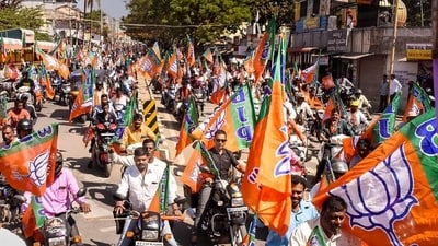 State Health Minister K Sudhakar, State General Secretary Siddaraju and other leaders welcomed the leaders and workers who joined the party. (PTI) State Health Minister K Sudhakar, State General Secretary Siddaraju and other leaders welcomed the leaders and workers who joined the party. (PTI)