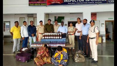 Navi Mumbai, India - April 11, 2023:Two women nabbed by Panvel RPF with alcohol worth ₹1 lakh at Panvel Railway Station in Navi Mumbai, India, on Tuesday, April 11, 2023. (Photo by Bachchan Kumar/ HT PHOTO) (HT PHOTO) Navi Mumbai, India - April 11, 2023:Two women nabbed by Panvel RPF with alcohol worth ₹1 lakh at Panvel Railway Station in Navi Mumbai, India, on Tuesday, April 11, 2023. (Photo by Bachchan Kumar/ HT PHOTO) (HT PHOTO)