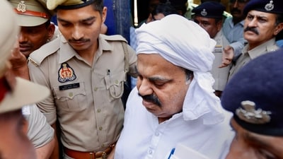 Gangster-turned-politician Atiq Ahmed being brought from Sabarmati Central Jail to present again before a Prayagraj court in the Umesh Pal murder case. (PTI) Gangster-turned-politician Atiq Ahmed being brought from Sabarmati Central Jail to present again before a Prayagraj court in the Umesh Pal murder case. (PTI)