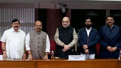 Union home minister Amit Shah with Karnataka chief minister Basavaraj Bommai, Maharashtra CM Eknath Shinde and the state deputy chief minister Devendra Fadnavis during a meeting in New Delhi at December last year. (PTI) Union home minister Amit Shah with Karnataka chief minister Basavaraj Bommai, Maharashtra CM Eknath Shinde and the state deputy chief minister Devendra Fadnavis during a meeting in New Delhi at December last year. (PTI)