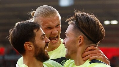 Manchester City's Jack Grealish celebrates scoring their second goal with Bernardo Silva and Erling Braut Haaland (REUTERS)