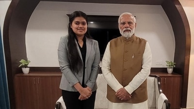 Prime Minister Narendra Modi with Indore's Tanishka Sujit during a meeting, in Bhopal. (PTI file)