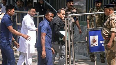 Tejashwi Yadav arrives at ED office in New Delhi on Tuesday morning. He was questioned for nine hours in ‘land-for-jobs’ case. (ANI) Tejashwi Yadav arrives at ED office in New Delhi on Tuesday morning. He was questioned for nine hours in ‘land-for-jobs’ case. (ANI)