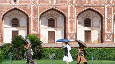 Visitors at Humayun’s Tomb on Tuesday. The 36.8°C recorded on Tuesday was at the Safdarjung weather station, which provides the representational data for Delhi. (Vipin Kumar/HT Photo) Visitors at Humayun’s Tomb on Tuesday. The 36.8°C recorded on Tuesday was at the Safdarjung weather station, which provides the representational data for Delhi. (Vipin Kumar/HT Photo)